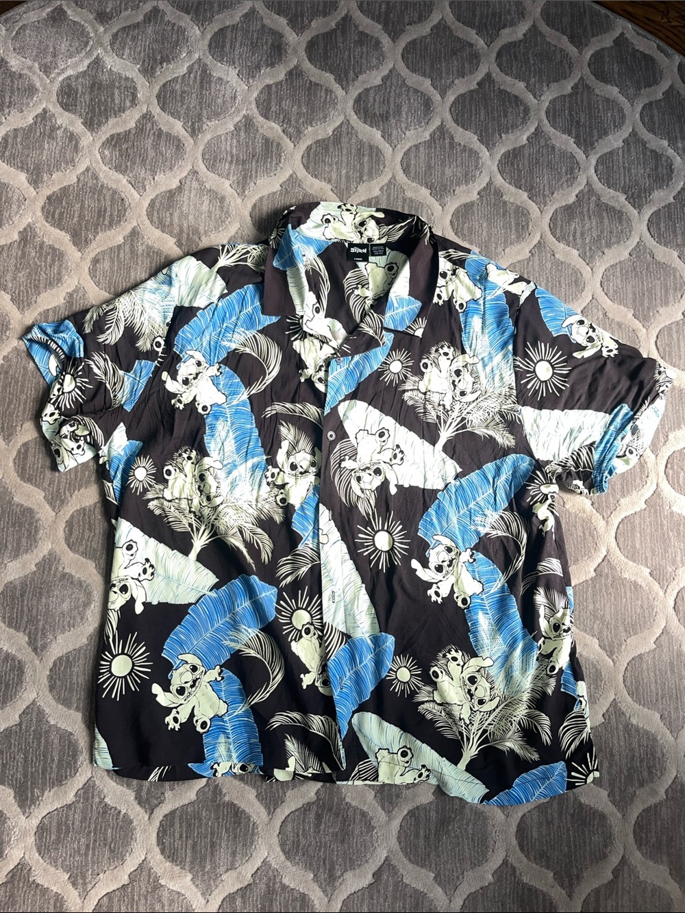 Men's Short-Sleeve Black Hawaiian Button-Down Shirt with Blue Palm Print